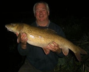 Chairman Paul Kitching with a 14lb 15oz Barbel 